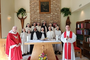 The first profession of Sister Catherine Marie with Fr. Don Goergen, OP and Fr. Dominic Rankin