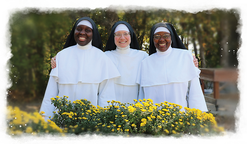 young nuns in the garden